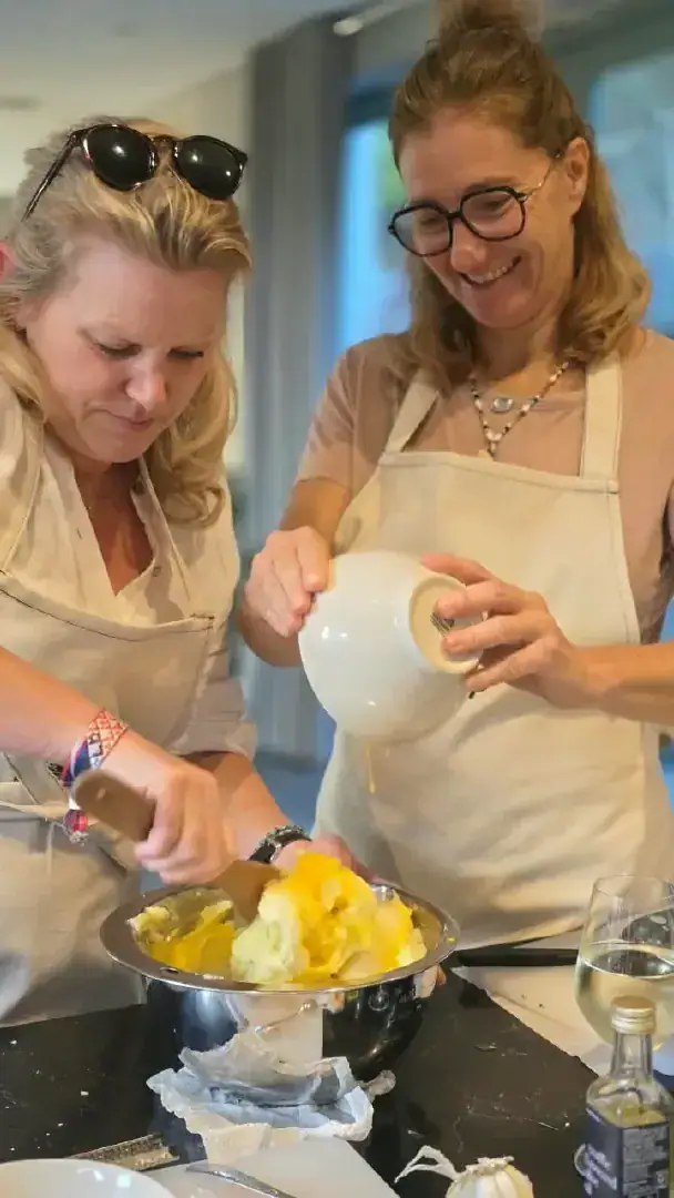 Two friends cooking together